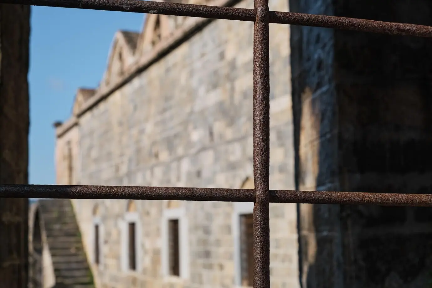 A cathedral closed for restoration in the abandoned Greek city of Karmilisos, situated near the village of Kayakoy in Fethiye, Turkey; a concept of tourism and the study of history.