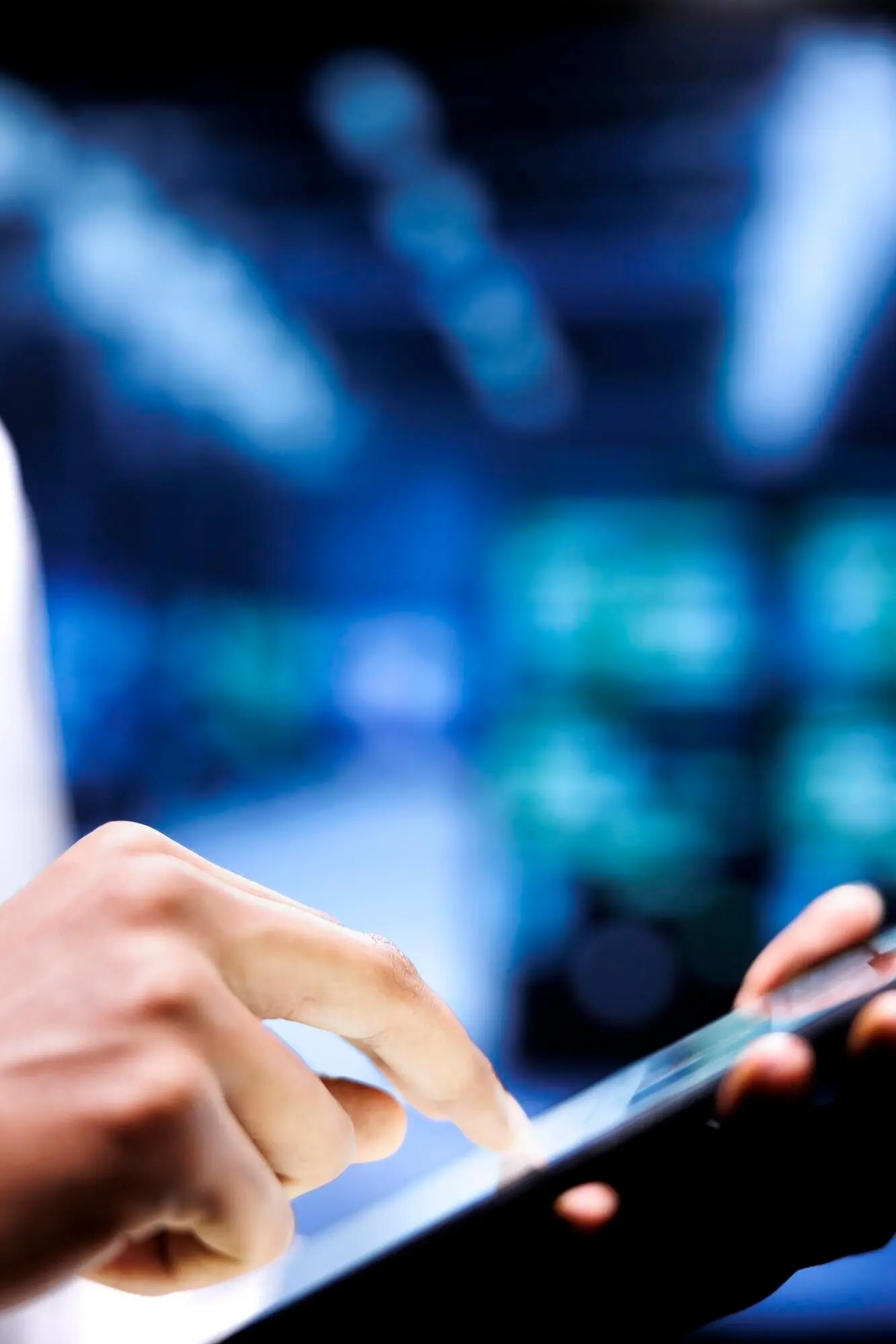 Skilled engineer drafting a data center disaster contingency plan on a tablet to enable rapid restoration of service, reduce disruption, and minimize interruptions to normal operations.